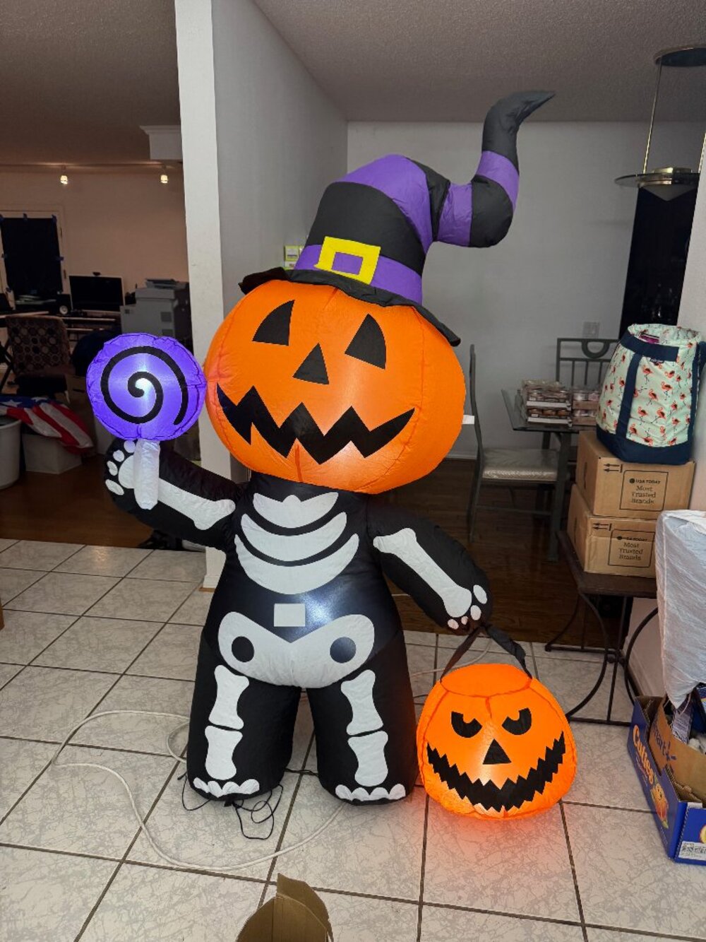 5ft Goosh Inflatable Halloween Pumpkin Skeleton with Candy Lollipop